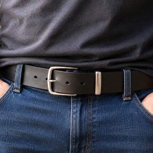 man with black full grain leather belt and silver brass buckle